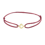 Script initial c silk bracelet in 14K yellow gold on burgundy silk