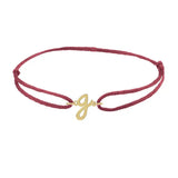 Script initial g silk bracelet in 14K yellow gold on burgundy silk