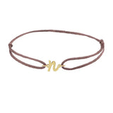 Script initial n silk bracelet in 14K yellow gold on brown silk