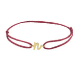 Script initial n silk bracelet in 14K yellow gold on burgundy silk