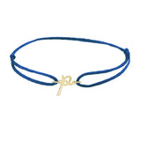 Script initial p silk bracelet in 14K yellow gold on blue silk