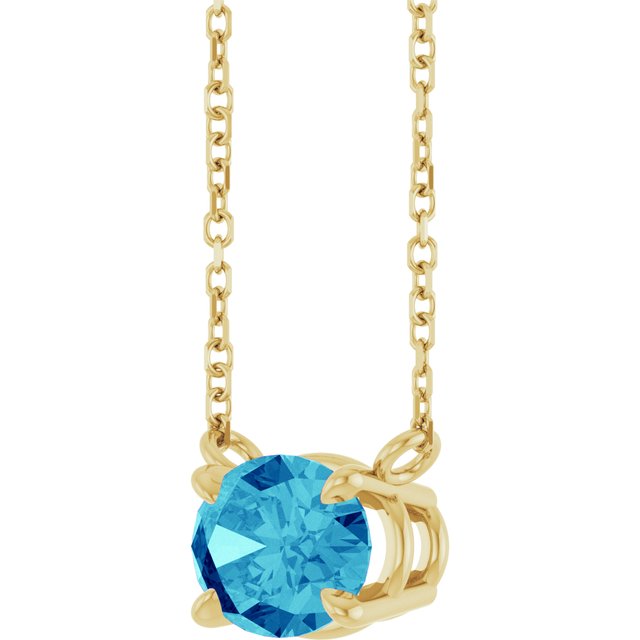 Setting Close up of East-west zircon birthstone necklace in 14K yellow gold