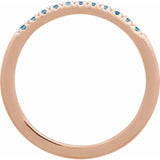 Side view of 14K rose gold Swiss topaz birthstone ring variant--14K-rose-gold