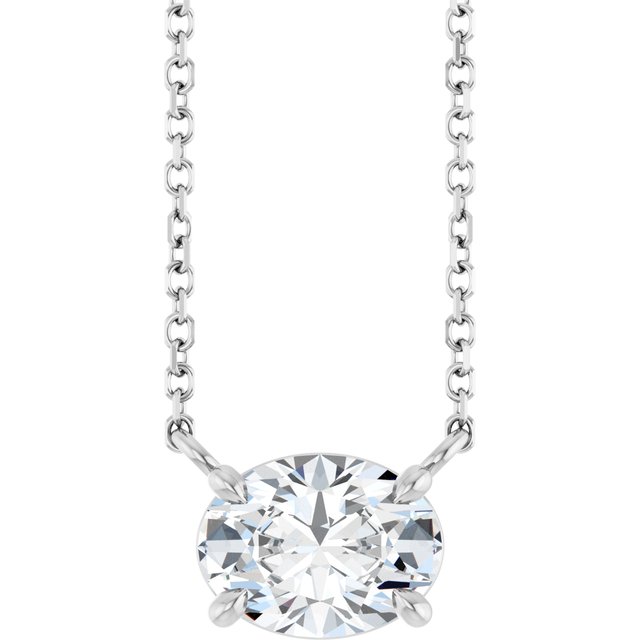 white sapphire gemstone set sideways in silver necklace