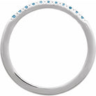 Side profile of Swiss blue topaz ring in white gold setting