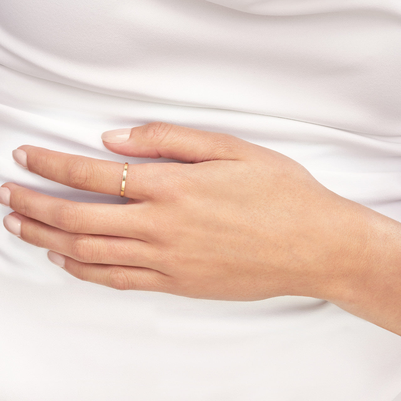 Slim 2mm 18K gold ring with polished finish