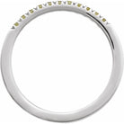 Detail view of peridot stacking band in 14K white gold