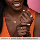 stacked birthstone bands shown on nodel