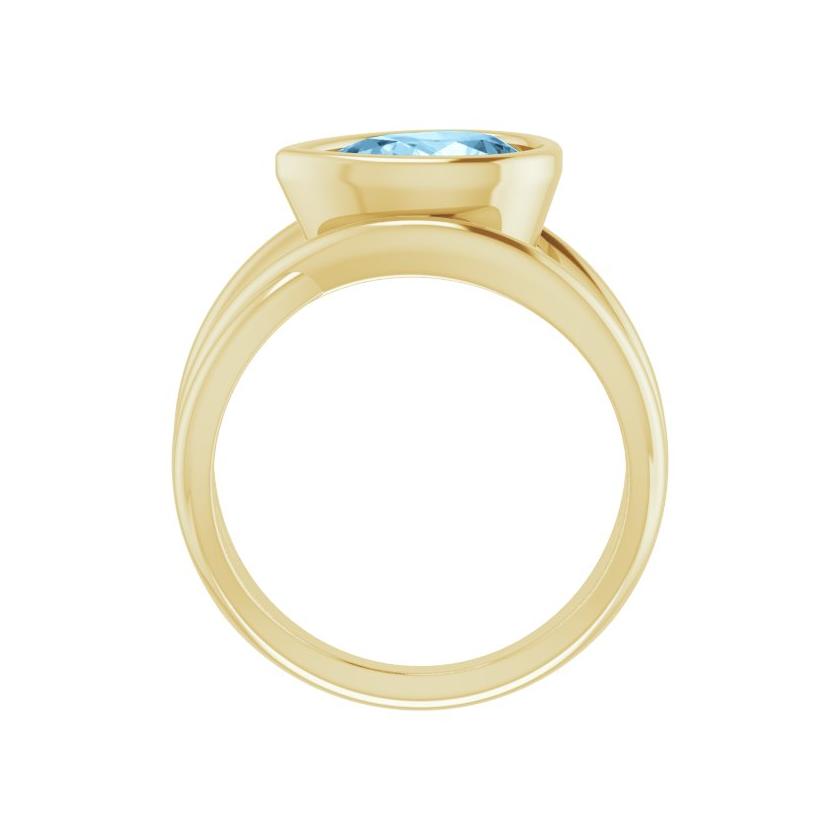 Eco-friendly cocktail ring with pear-cut blue aquamarine in sculptural setting
