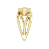 Sustainable yellow gold ring with aquamarine center stone, USA-made