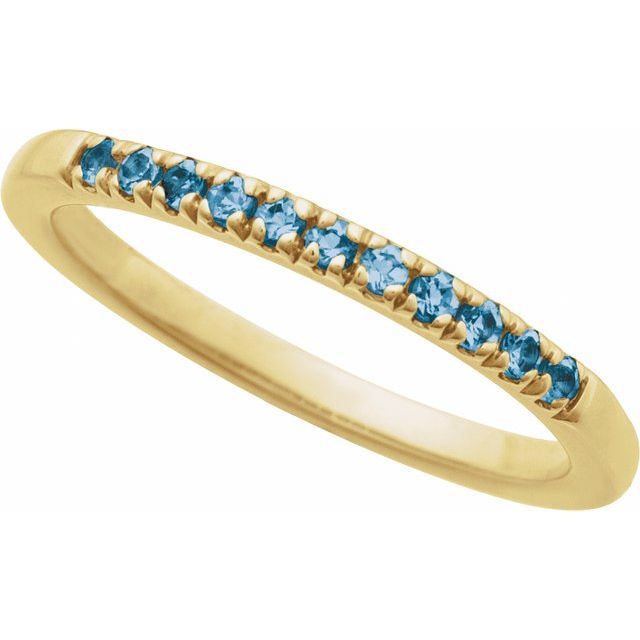 14K yellow gold stackable ring with 11 Swiss blue topaz gemstones