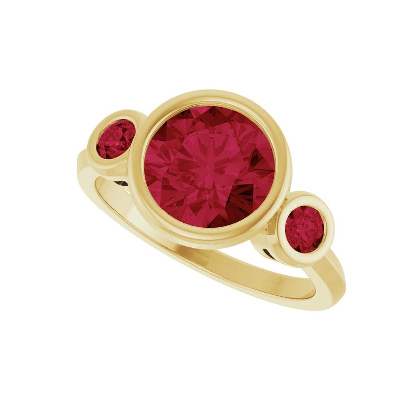 Three-stone ruby cocktail ring in 10K yellow gold with lab-created center and side stones