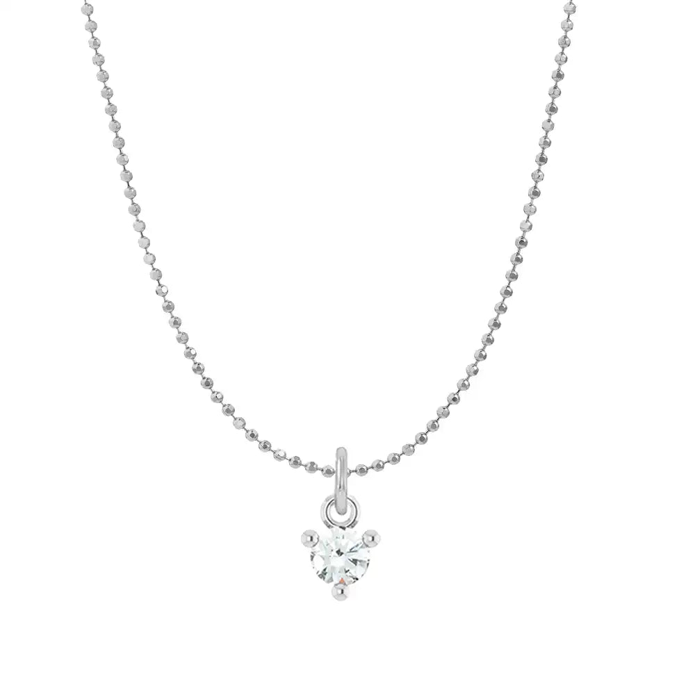 Tiny diamond solitaire necklace in 14K white gold