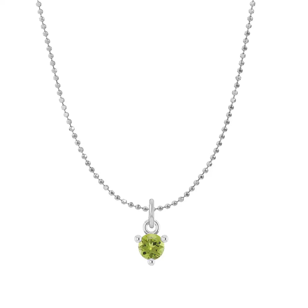 Tiny peridot solitaire necklace in 14K white gold