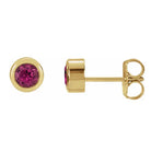 Pink tourmaline bezel stud earrings side view in 14K yellow gold variant--14K rose gold