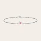 Bezel-set birthstone bracelets displayed together. variant--14K white gold