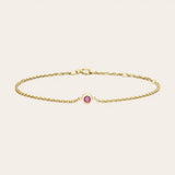 Close-up of 3mm pink tourmaline bezel-set bracelet clasp yellow gold variant--14K-yellow-gold variant--Tourmaline