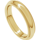 Angled view of polished 14K gold milgrain edge ring