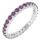 Alexandrite eternity ring in 10K white gold, handcrafted using recycled metal.