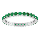 Minimalist white gold stacking ring set with sustainably sourced Emerald gems.