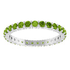 Ethical Peridot ring in solid 10K white gold with a full circle of 2mm gemstones.