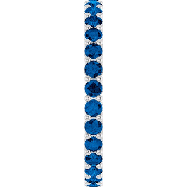 Minimalist white gold stacking ring set with sustainably sourced Sapphire gems.