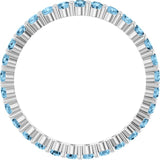 Elegant 10K white gold eternity band with round Swiss Blue Topaz stones, handmade in the USA. Topaz white gold variant--Swiss-Topaz variant--10K-white-gold