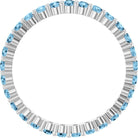 Elegant 10K white gold eternity band with round Swiss Blue Topaz stones, handmade in the USA.
