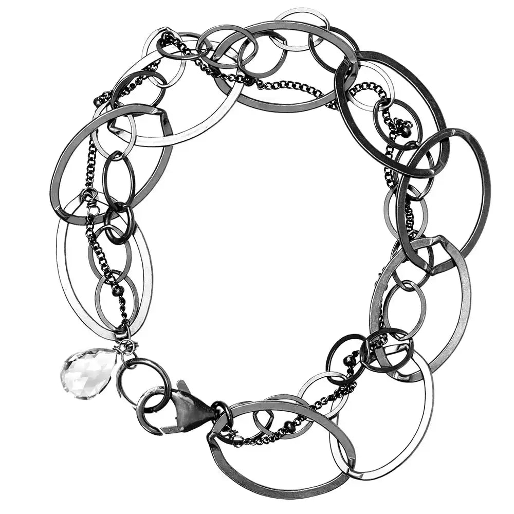 Natural white topaz woven chain bracelet in sterling silver, flat lay on neutral background sterling silver variant--White-Topaz variant--Oxidized-sterling-silver