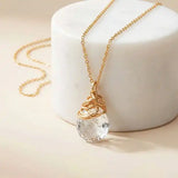 Natural white topaz pendant necklace in gold-fill editorial shot  variant--Gold-fill, variant--Rose-gold-fill, variant--Sterling-silver, variant--Oxidized-sterling-silver variant--White-Topaz