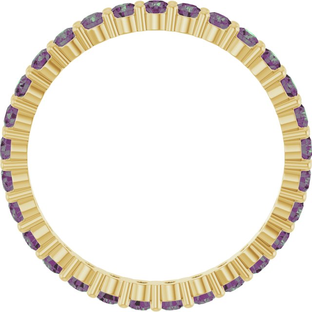Eco-friendly yellow gold ring featuring Alexandrite birthstones, perfect for layering.