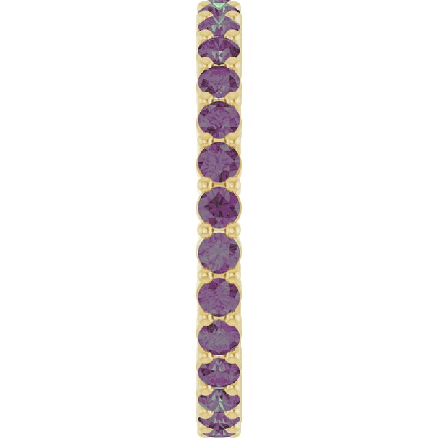 Elegant 10K yellow gold eternity band with round Alexandrite stones, handmade in the USA.
