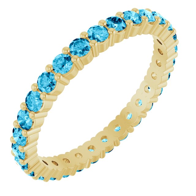 Ethical Aquamarine ring in solid 10K yellow gold with a full circle of 2mm gemstones.