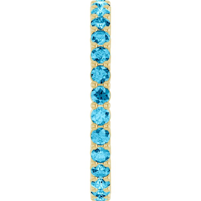 Elegant 10K yellow gold eternity band with round Aquamarine stones, handmade in the USA.