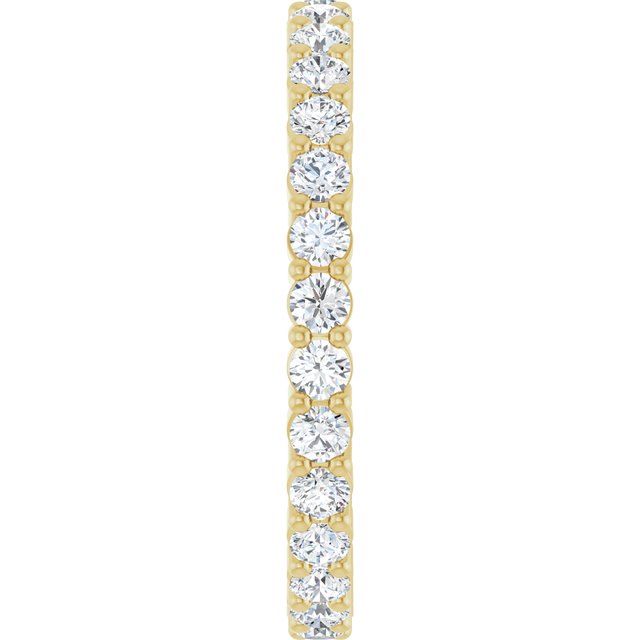 Minimalist yellow gold stacking ring set with sustainably sourced Diamond gems.