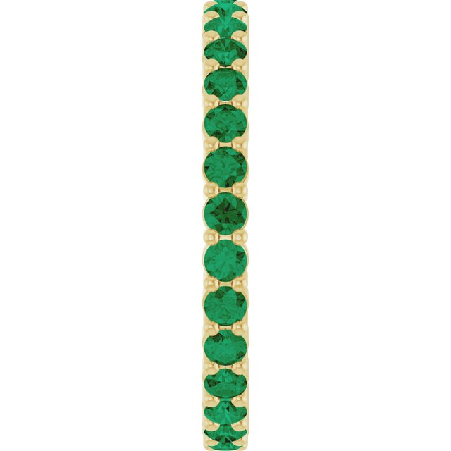 Ethical Emerald ring in solid 10K yellow gold with a full circle of 2mm gemstones.
