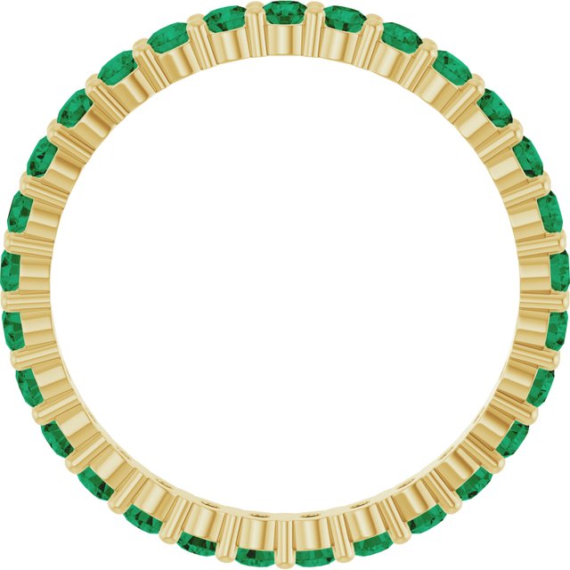 Elegant 10K yellow gold eternity band with round Emerald stones, handmade in the USA.