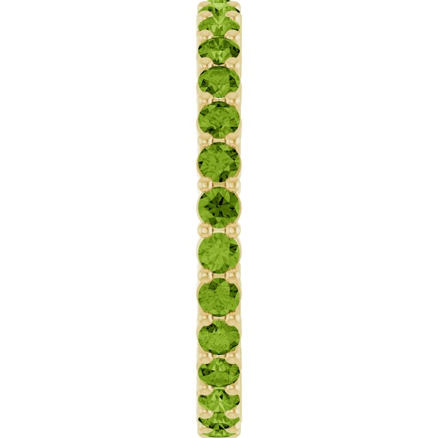 Minimalist yellow gold stacking ring set with sustainably sourced Peridot gems.