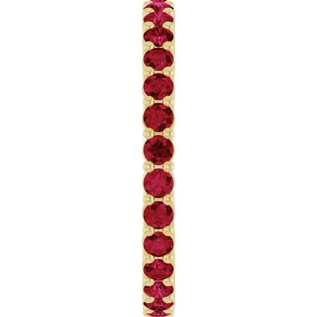 Minimalist yellow gold stacking ring set with sustainably sourced Ruby gems.