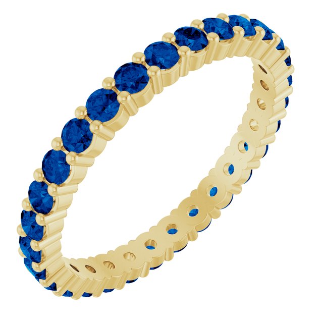 Sapphire eternity ring in 10K yellow gold, handcrafted using recycled metal.