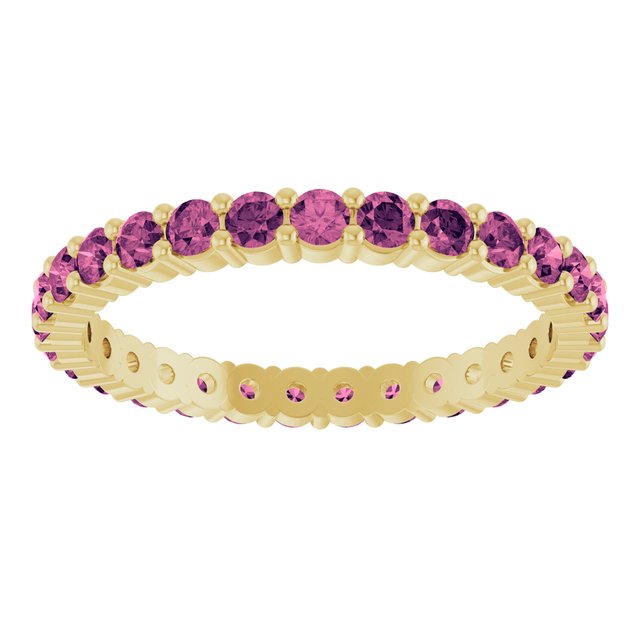 Minimalist yellow gold stacking ring set with sustainably sourced Tourmaline gems.