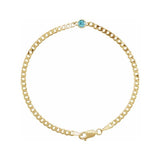 14K yellow gold zircon birthstone bracelet on white background.