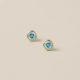 Zircon stud earrings in 14K gold, 4mm blue zircon, product shot