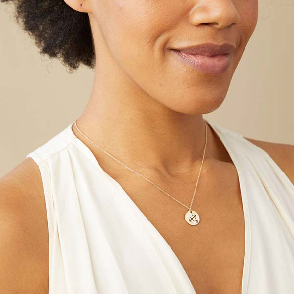 Zodiac Charm Necklace in Gold with and Amethyst on model