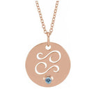 Dainty Cancer zodiac pendant and gemstone charm necklace in polished 14K rose gold.
