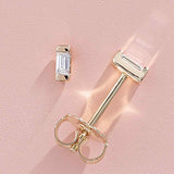 Baguette diamond stud earrings in 14K gold