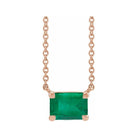Minimalist 14K rose gold Emerald birthstone necklace featuring a 5x3mm emerald-cut pendant.