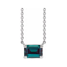 Minimalist 14K white gold Alexandrite birthstone necklace featuring a 5x3mm emerald-cut pendant.