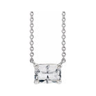 Minimalist 14K white gold White Sapphire birthstone necklace featuring a 5x3mm emerald-cut pendant.