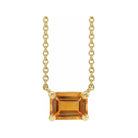 Minimalist 14K yellow gold Citrine birthstone necklace featuring a 5x3mm emerald-cut pendant.